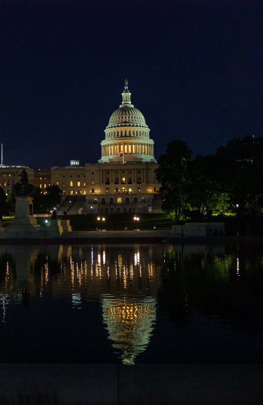 capitol building reflected in fountain