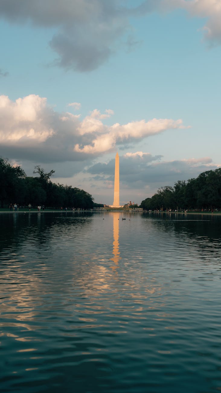 serene view of the washington monument at dusk