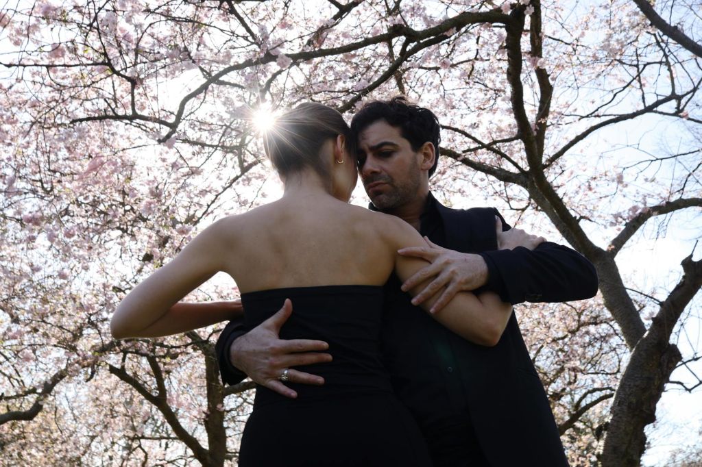 romantic dance under cherry blossom trees