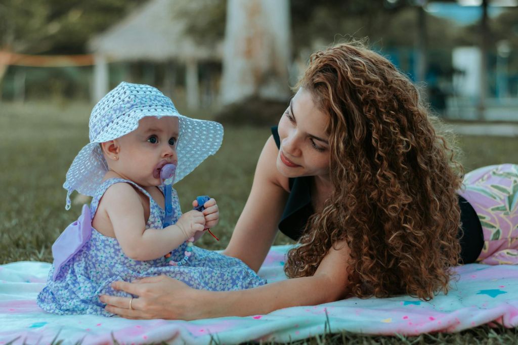 mother looking at her cute daughter
