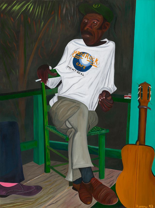 A man wearing a white t-shirt with the "Havrock" logo sits on a green chair in a tropical setting, holding a guitar.