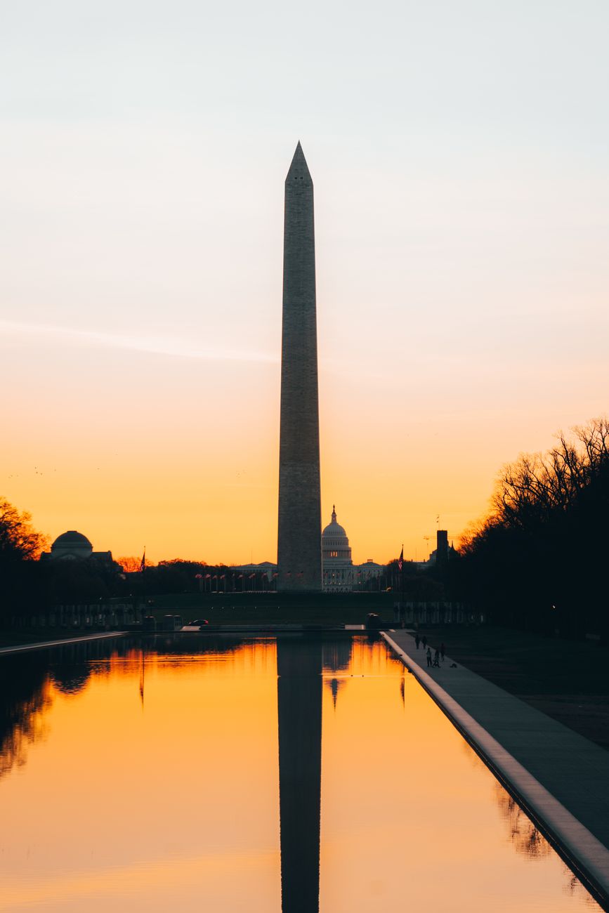 the washington monument in washington dc during sunset